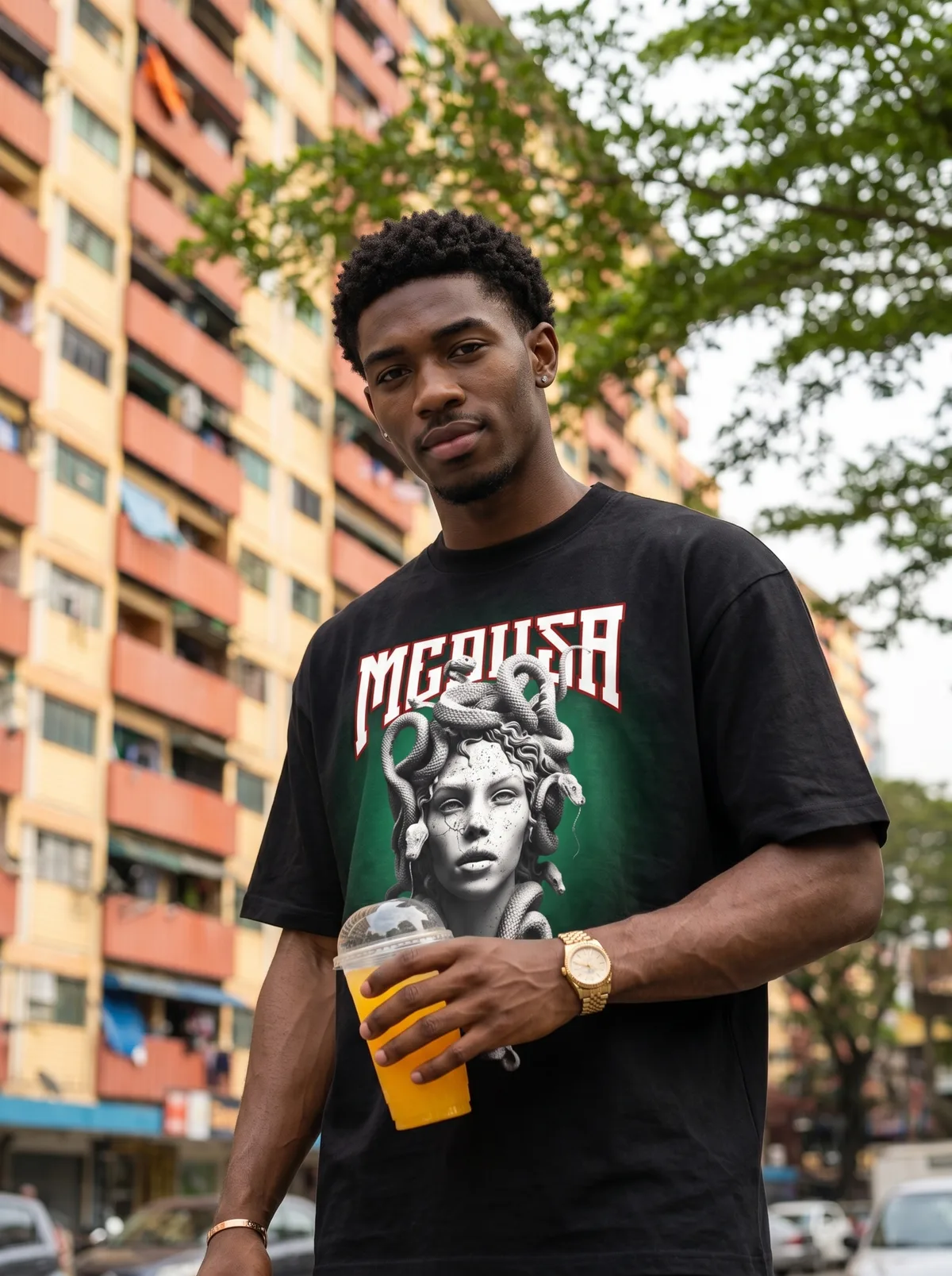 Fictional adult Black man wearing a graphic T-shirt in a warm city lifestyle scene